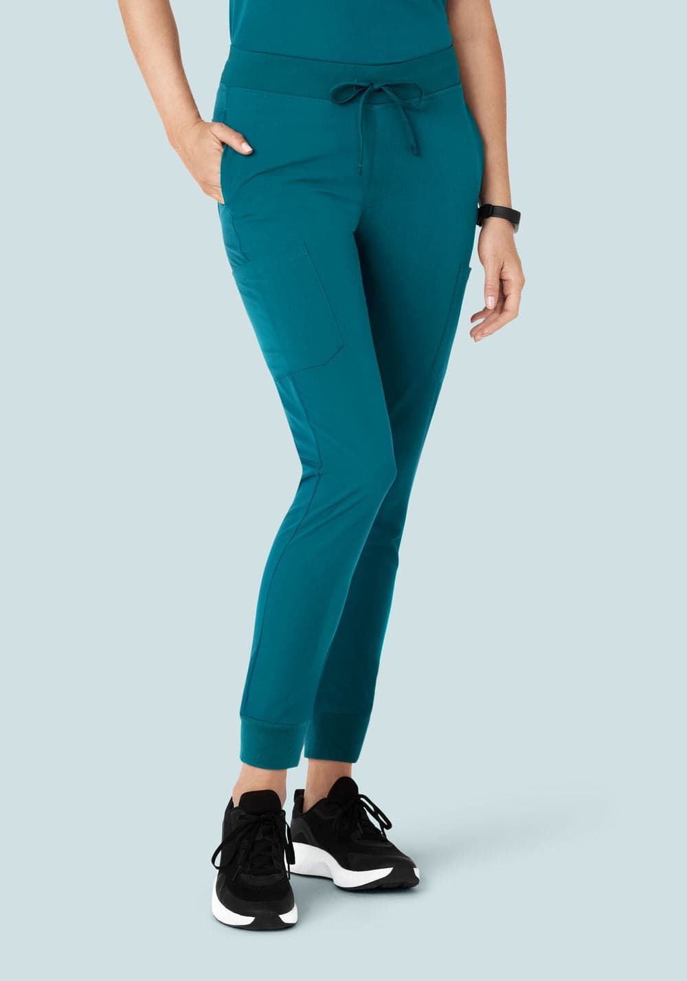 9 Cepli Jogger Scrub Pantolon — Tavus Yeşili